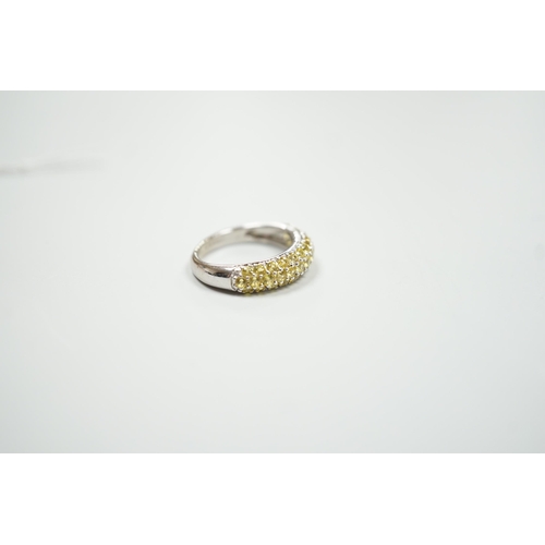 1887 - A modern 18ct white gold and yellow stone cluster set half hoop ring, size K, gross weight 4.2 grams... 