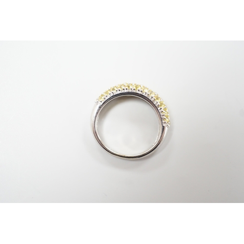 1887 - A modern 18ct white gold and yellow stone cluster set half hoop ring, size K, gross weight 4.2 grams... 