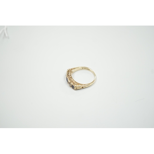 1889 - A modern Victorian style 9ct gold, three stone sapphire and two stone diamond set half hoop ring, si... 