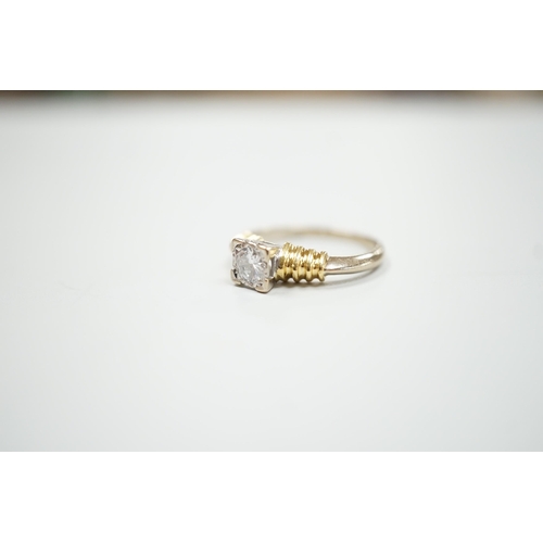 1890 - A modern 18ct two colour gold and solitaire diamond set ring, size H/I, gross weight 3.3 grams.... 