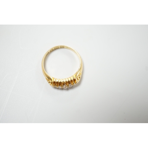 1891 - An early 20th century 18ct gold and graduated five stone diamond chip set ring, size L, gross weight... 