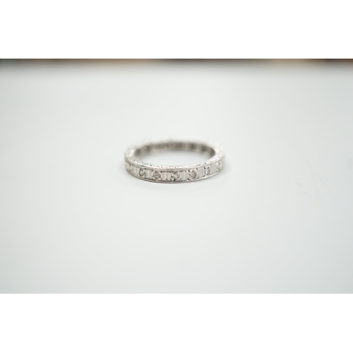 1892 - A white metal, stamped plat and diamond chip set full eternity ring, size K, gross weight 3.7 grams.... 