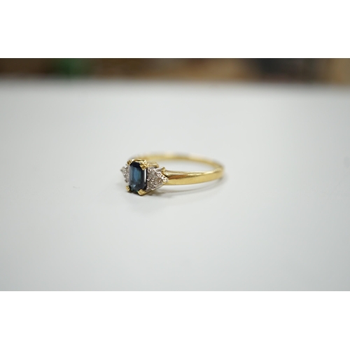 1894 - A modern 18ct gold and single stone sapphire set ring, with six stone diamond set shoulders, size R,... 