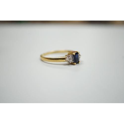 1894 - A modern 18ct gold and single stone sapphire set ring, with six stone diamond set shoulders, size R,... 