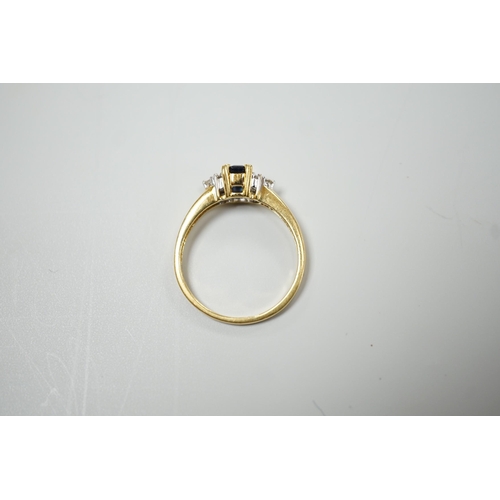 1894 - A modern 18ct gold and single stone sapphire set ring, with six stone diamond set shoulders, size R,... 