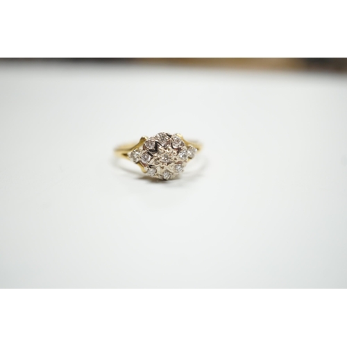 1898 - A modern 18ct gold and diamond chip set cluster ring, size 4 grams.