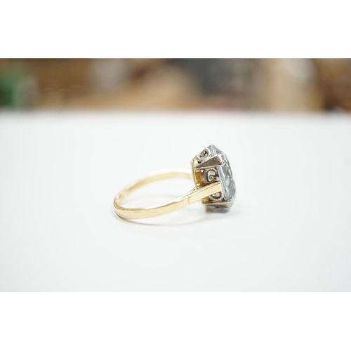 1901 - An 18ct and oval cut aquamarine set ring, (shank cut), size P, gross weight 5.3 grams.