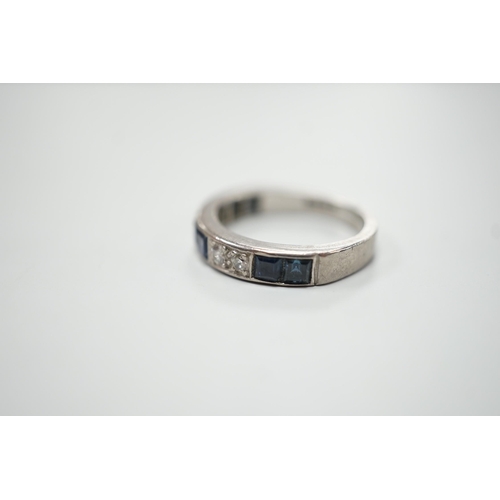 1912 - A modern 18ct white gold, six stone sapphire and four stone diamond set half eternity ring, size M, ... 