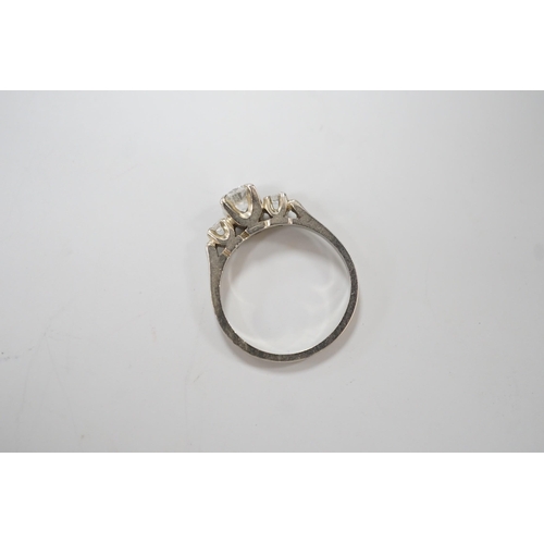 1914 - A Canadian Birks 18k white metal and single stone diamond ring, with diamond set shoulders, size H, ... 