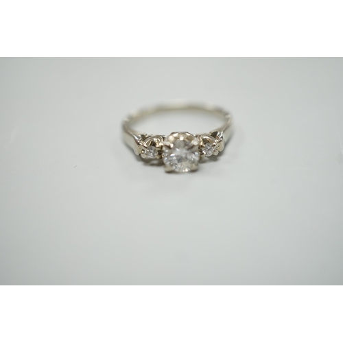 1914 - A Canadian Birks 18k white metal and single stone diamond ring, with diamond set shoulders, size H, ... 