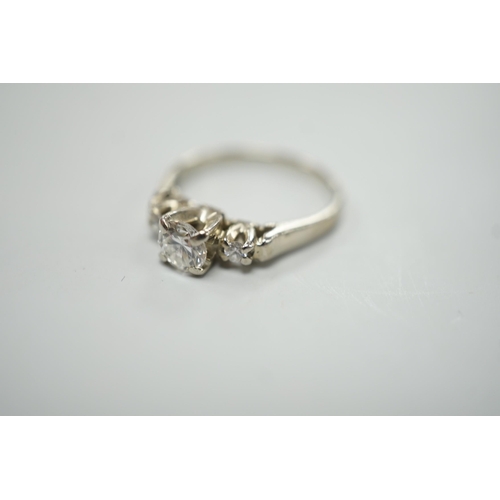 1914 - A Canadian Birks 18k white metal and single stone diamond ring, with diamond set shoulders, size H, ... 