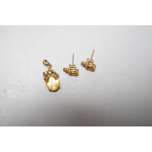 1917 - A modern 14k, citrine and diamond chip set pendant, 15mm and a pair of matching ear studs, gross wei... 