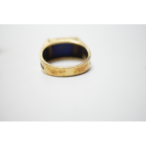 1918 - A modern 585 yellow metal and lapis lazuli set signet ring, size W, gross weight 11.9 grams.