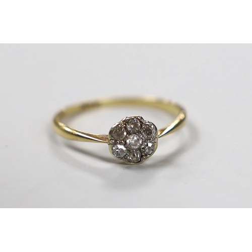 1927 - An 18ct and diamond cluster ring, size L/M, gross weight 1.4 grams.