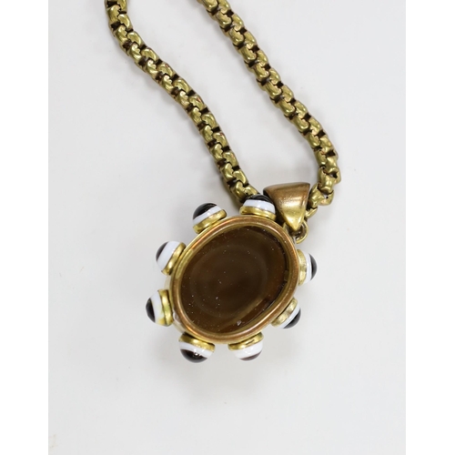 1939 - A Victorian pinchbeck and banded agate set pendant, 39mm, on a gilt metal chain.