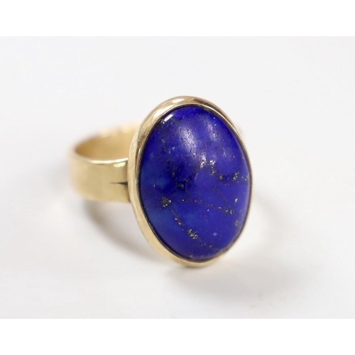 1948 - An Elizabeth II 9ct gold and oval lapis lazuli set ring, size P/Q, gross weight 6.7 grams.