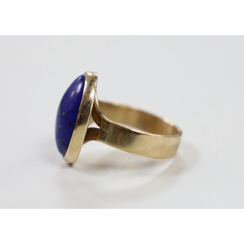 1948 - An Elizabeth II 9ct gold and oval lapis lazuli set ring, size P/Q, gross weight 6.7 grams.