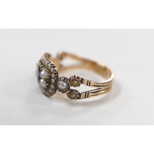 1949 - A 19th century yellow metal, foil backed? garnet and split pearl set ring (repair), size O/P, gross ... 