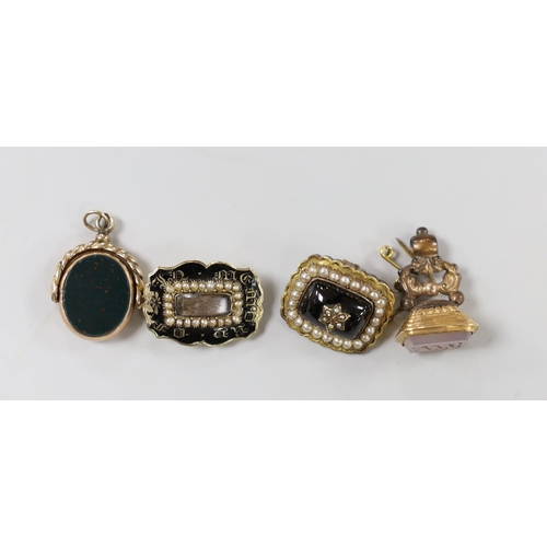 1953 - Two Victorian yellow metal and split pearl set mourning brooches, one with black enamel and inscribe... 