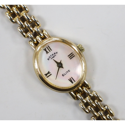 1954 - A lady's modern 9k Rotary Elite oval dial quartz wrist watch, on a 375 bracelet, overall 18cm, gross... 