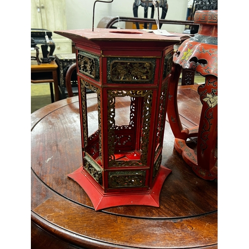 113 - A Chinese red lacquer circular vase stand, diameter 44cm, height 47cm together with a similar Chines... 