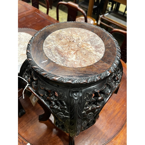 116 - A Chinese circular marble top hongmu vase stand, width 34cm, height 60cm