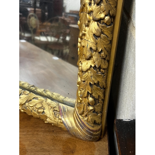 130 - A Victorian rectangular carved giltwood mirror, width 41cm, height 52cm