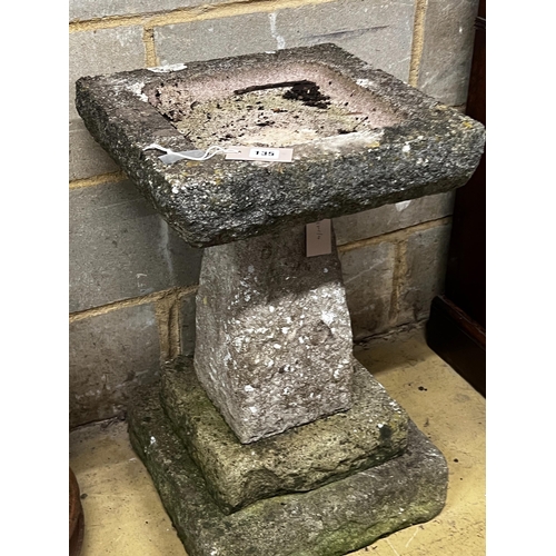 135 - A reconstituted stone garden bird bath, width 40cm, height 65cm