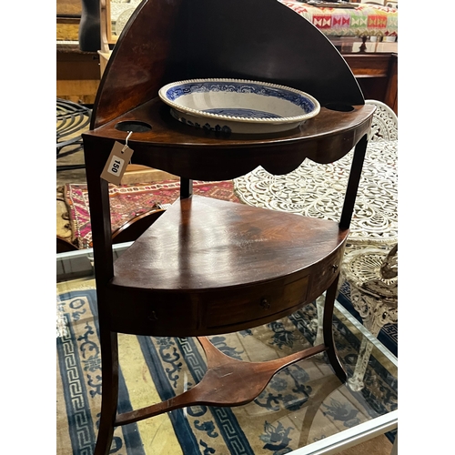 150 - A George III mahogany bowfront corner washstand