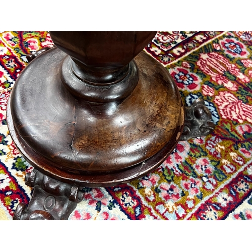 153 - An early Victorian mahogany revolving piano stool