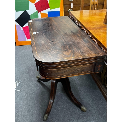 157 - A Regency inlaid rosewood D shaped folding card table, width 86cm, depth 44cm, height 74cm