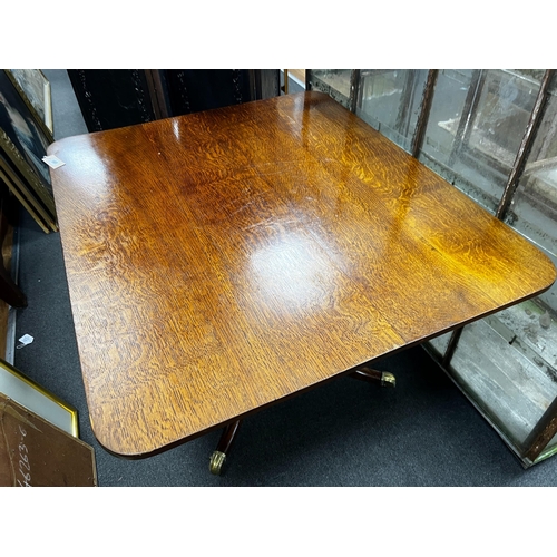 161 - A Regency rectangular oak tilt top dining table, length 110cm, width 94cm, height 72cm