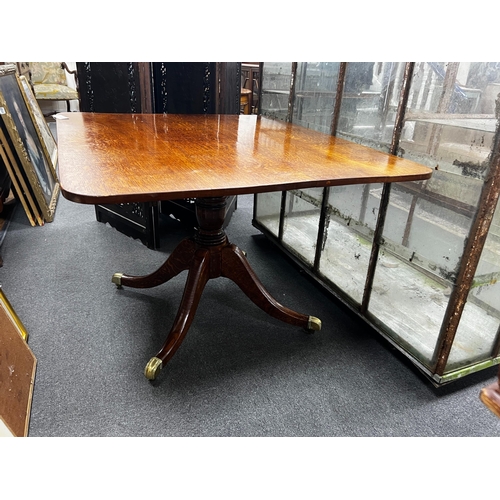 161 - A Regency rectangular oak tilt top dining table, length 110cm, width 94cm, height 72cm