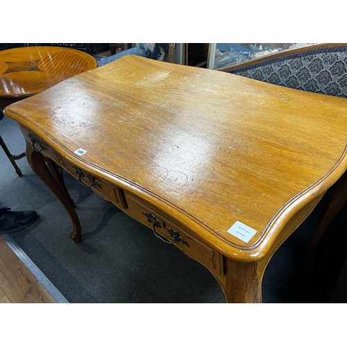 166 - An early 20th century French serpentine three drawer side table, width 108cm, depth 62cm, height 76c... 