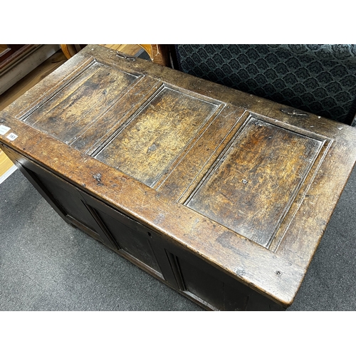 167 - An 18th century panelled oak coffer, length 103cm, depth 53cm, height 64cm