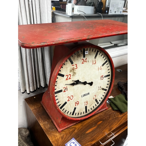 183 - An industrial style painted metal clock console table modelled as a set of scales, width 102cm, dept... 