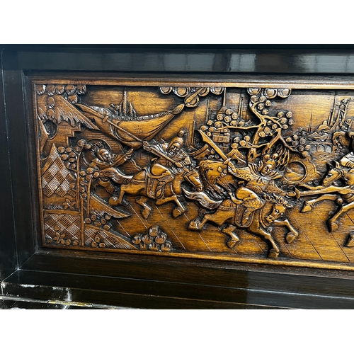 2 - A Chinese carved hinged top cocktail cabinet with mirrored interior, width 111cm, depth 46cm, height... 