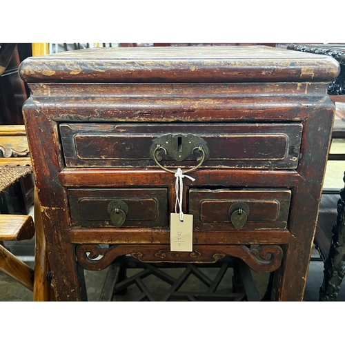 25 - A Chinese lacquered wood three drawer side table, width 43cm, depth 44cm, height 77cm