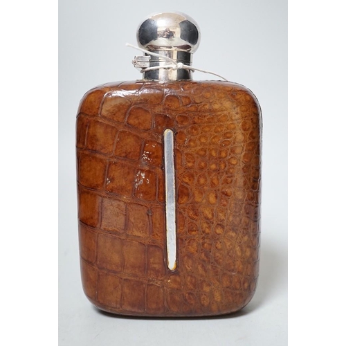 258 - A large Dixon's crocodile skin covered hip flask, early 20th century,  20cms high