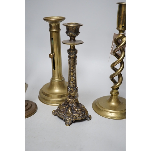 263 - Five various brass candlesticks, tallest 26cms high