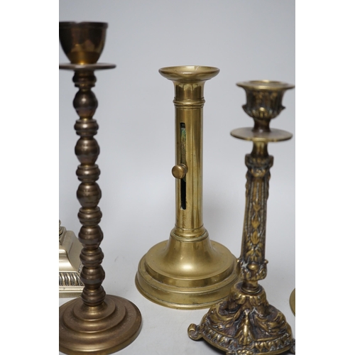 263 - Five various brass candlesticks, tallest 26cms high