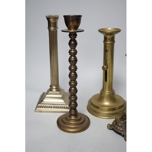 263 - Five various brass candlesticks, tallest 26cms high