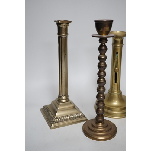 263 - Five various brass candlesticks, tallest 26cms high