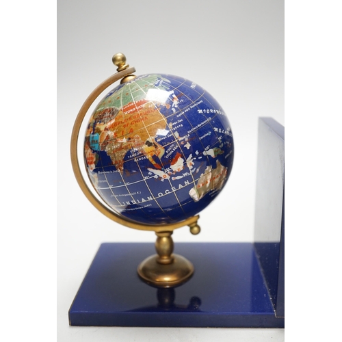 264 - A pair of hardstone mounted acrylic terrestrial globe bookends. 18cm tall