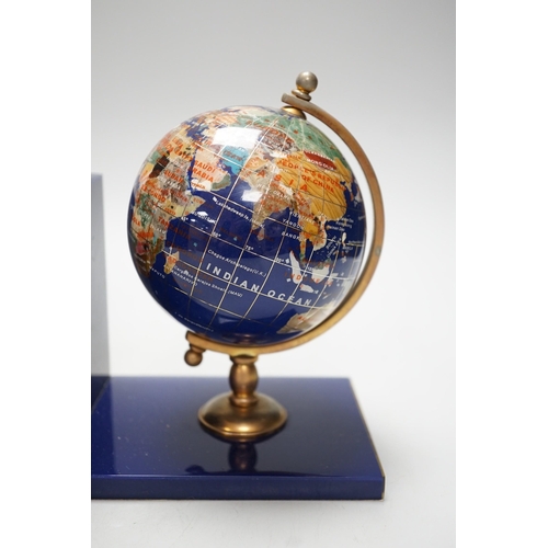 264 - A pair of hardstone mounted acrylic terrestrial globe bookends. 18cm tall