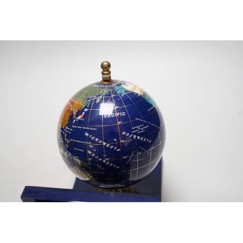 264 - A pair of hardstone mounted acrylic terrestrial globe bookends. 18cm tall