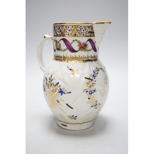 266 - An 18th century Caughley very rare polychrome mask jug, elaboratley painted and gilded with two init... 