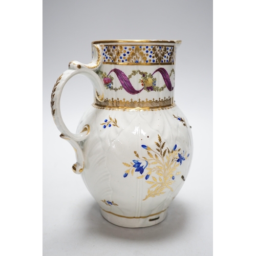 266 - An 18th century Caughley very rare polychrome mask jug, elaboratley painted and gilded with two init... 