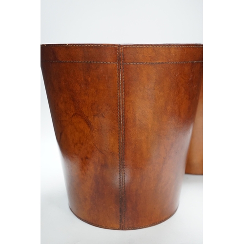 277 - Two brown leather waste paper bins, 30cms high,