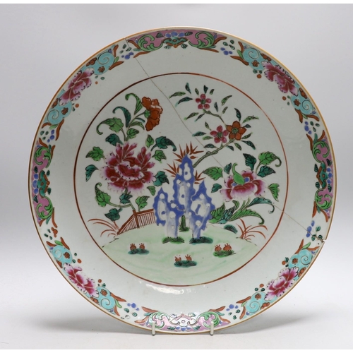 285 - An 18th century Chinese famille rose charger and a Canton plate,  charger 36cms